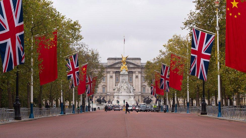 The Mall covered in Union Jacks and Chinese flags