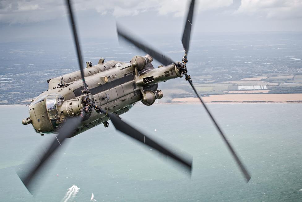 A 27 Sqn Chinook makes a hard bank over The Solent during a Aircraft Handling Exercise