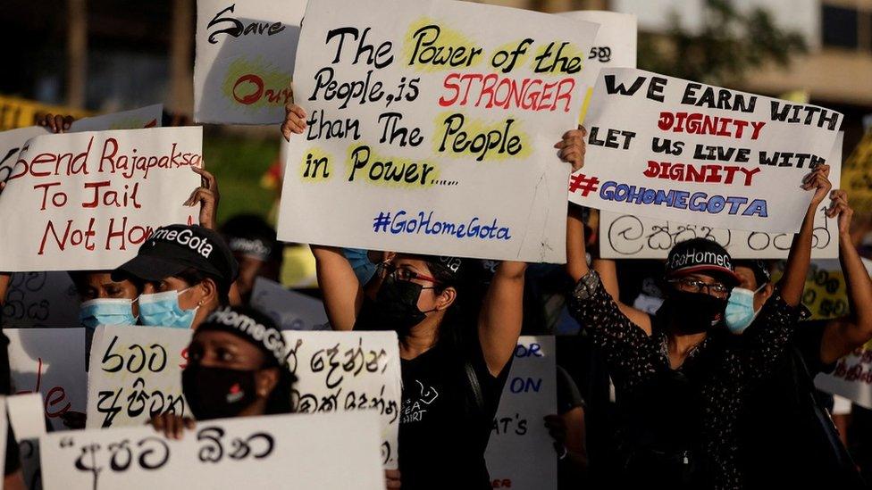 Demonstrators holding placards take part in a protest against Sri Lankan President Gotabaya Rajapaksa, near the Presidential Secretariat, amid the country's economic crisis, in Colombo, Sri Lanka, April 23, 2022.