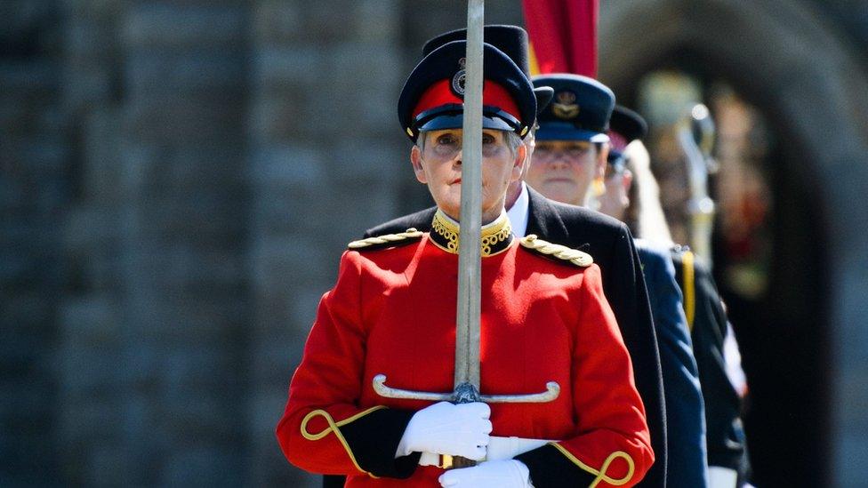 Procession to Tynwald Hill led by the by the bearer of the Manx Sword of State