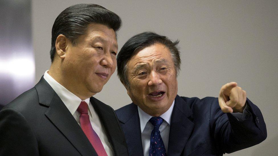 Chinese President Xi Jinping is shown around the offices of Huawei by Ren Zhengfei, president of Huawei, in London