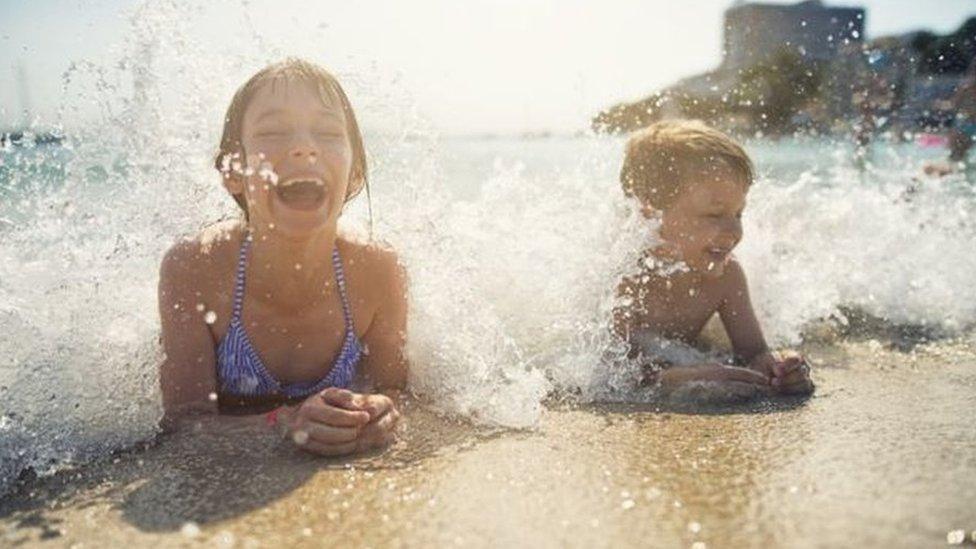 Children in the sea on holiday