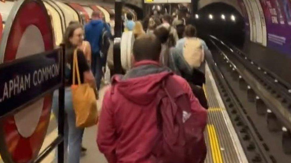 Passengers walking out of the station