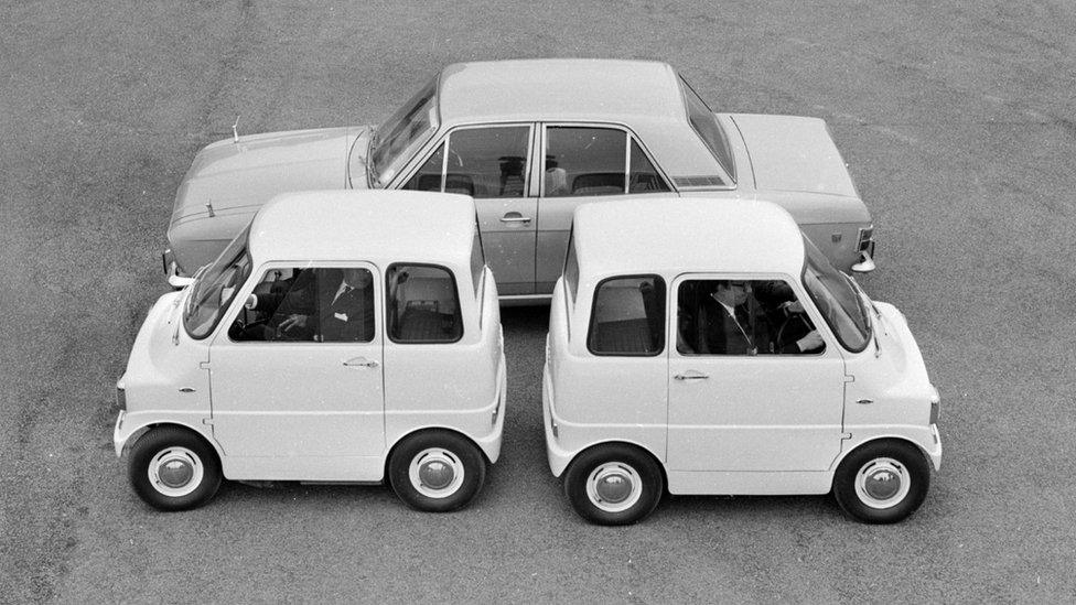 Two Ford Comutas