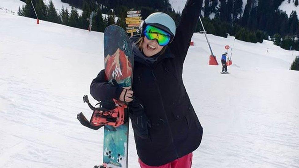 Emma snowboarding