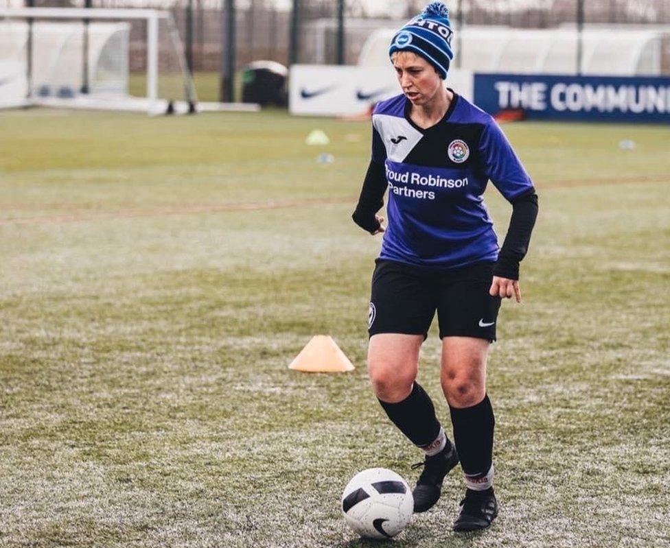 Saskia playing football