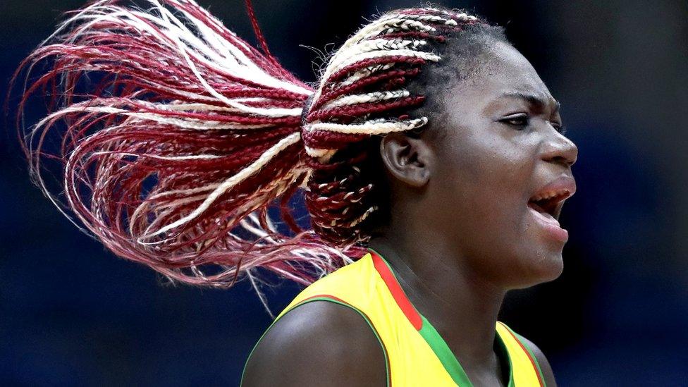 At the Olympics in Rio, Cameroon's Bodo Essissima Madeleine Samantha celebrates during a women's preliminary volleyball match.