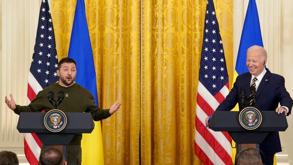 Joe Biden and Volodymyr Zelenskiy hold a joint news conference in the East Room of the White House