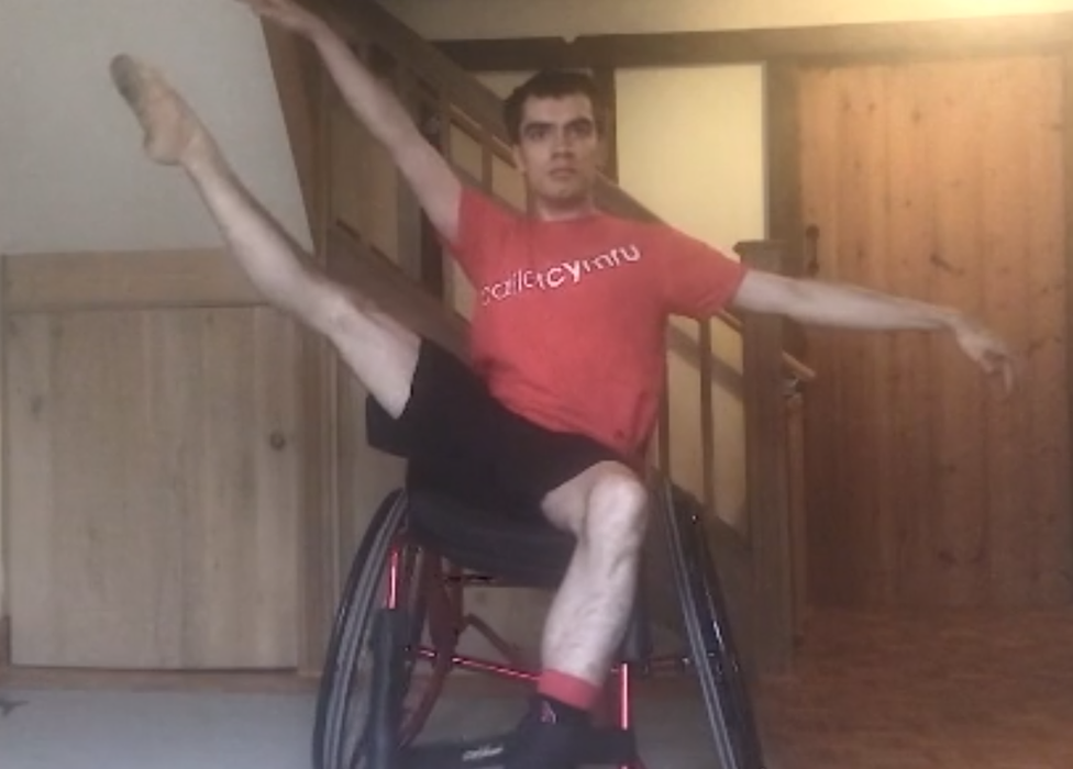 Joe Powell-Main performing ballet in his wheelchair