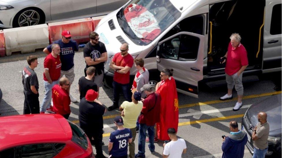 Liverpool supporters heading for the Champions League Final in Paris wait amongst freight and holiday traffic queues at the Port of Dover in Kent.