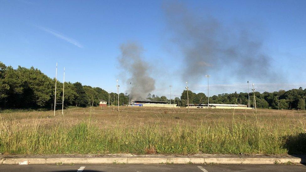 Smoke coming out of the stadium