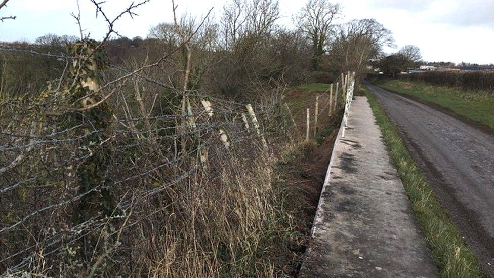 Fence alongside Abbey Road, Rhuddlan