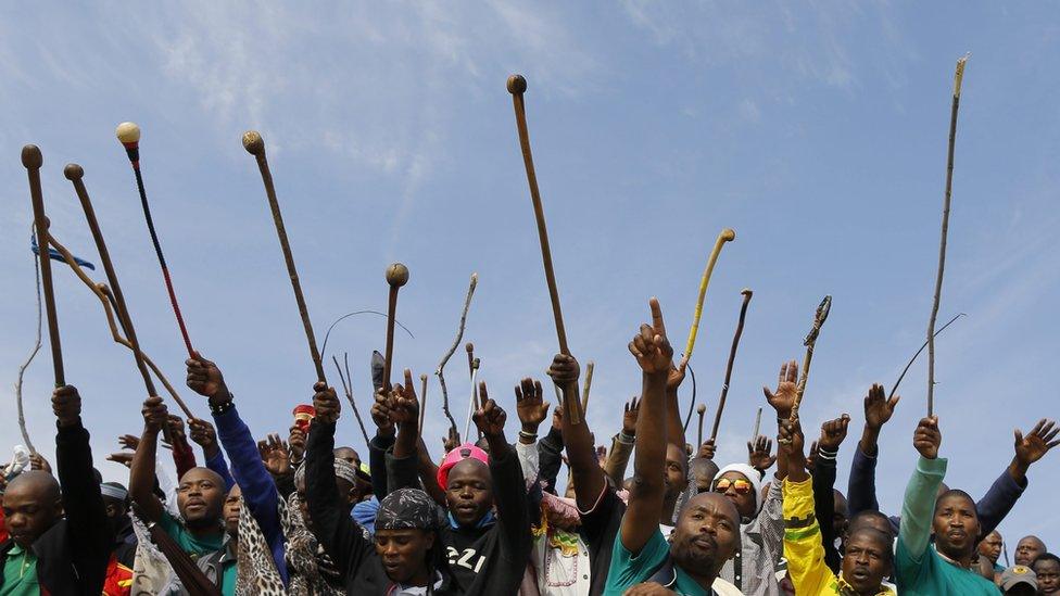 South African miners in Marikana dance, sing and wave sticks - Tuesday 16 August 2016