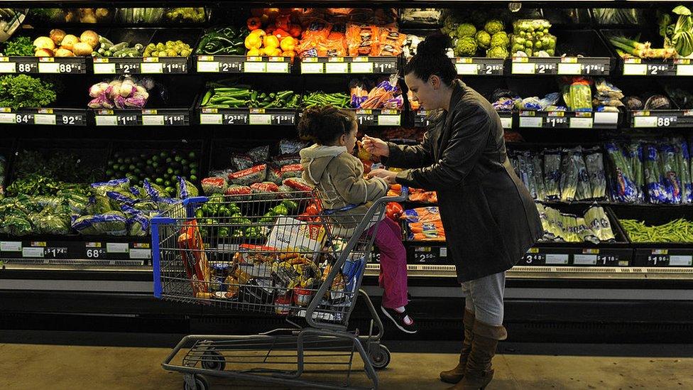 Woman and child in grocery store