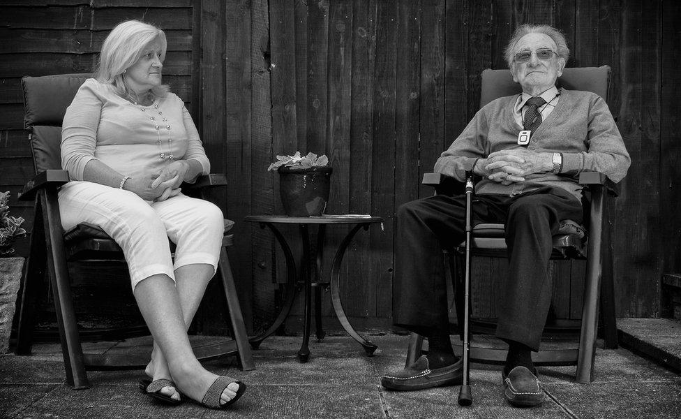 Gill West with her father George in his garden in Harrow