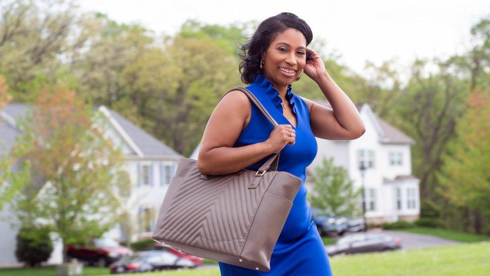 Sherrill Mosee models a MinkeeBlue tote bag