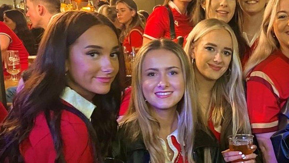 Cerys (front) with friends for a rugby international