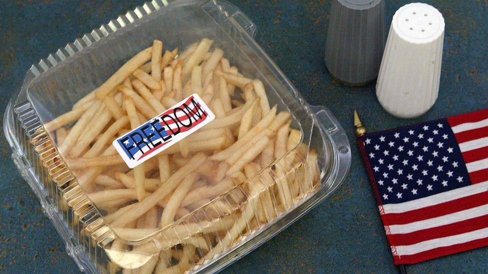 A box of 'Freedom Fries' is seen with an American flag at a cafeteria in the U.S. Capitol building on Capitol Hill on 12 March 2003 in Washington, DC.