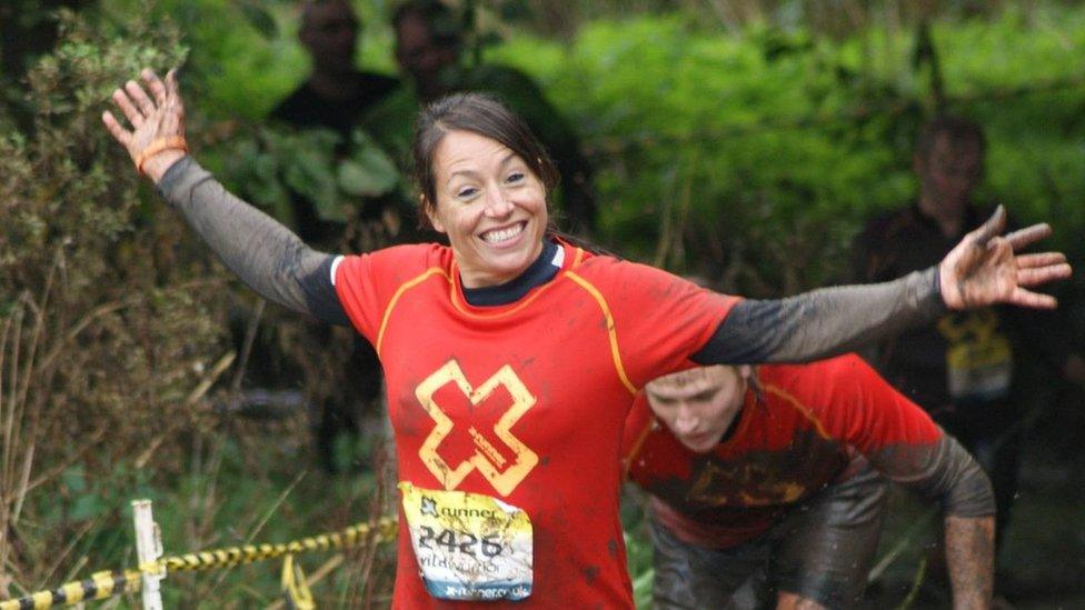 Participant in a obstacle course race