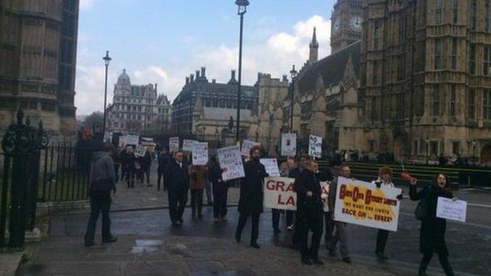 Street lights protest on the march through Westminster