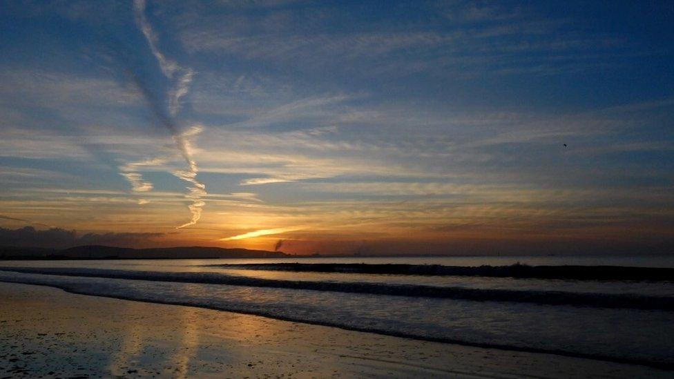 Swansea sunrise - It pays to get up early sometimes, this stunning image of the sun rising over Swansea beach was taken by Lisa Medcalf