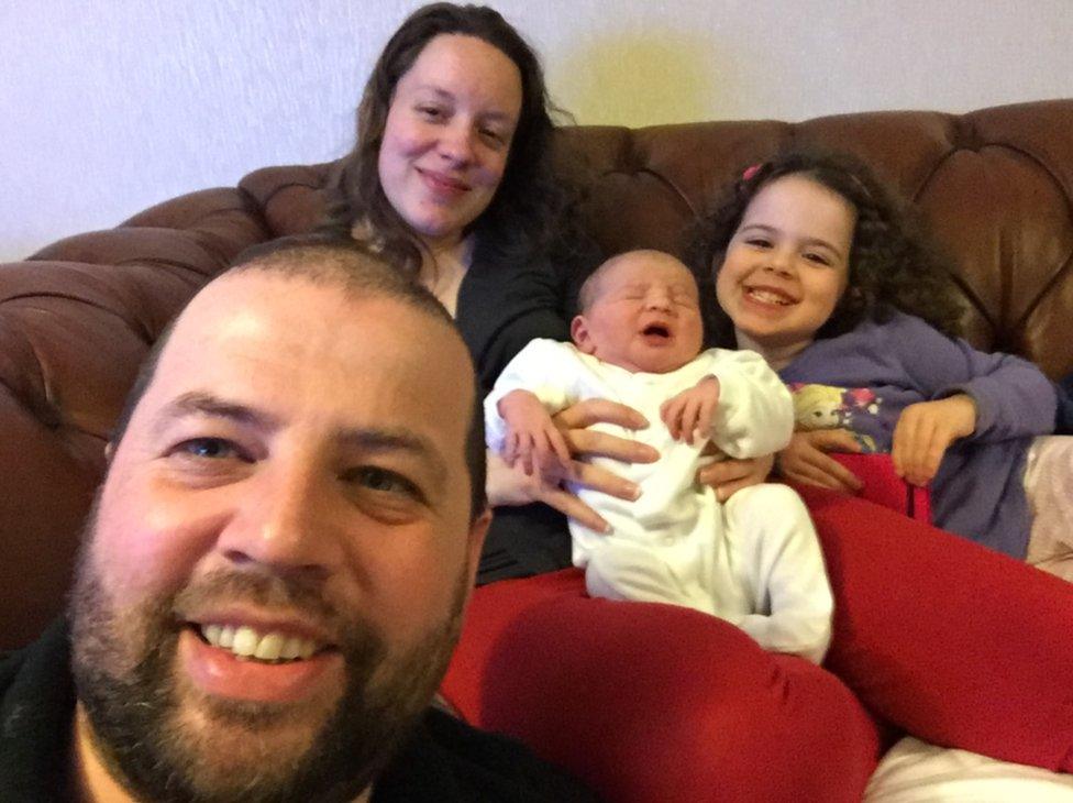 Kayleigh and Colin Griffiths with their one-day-old daughter Pippa and her sister Brooke