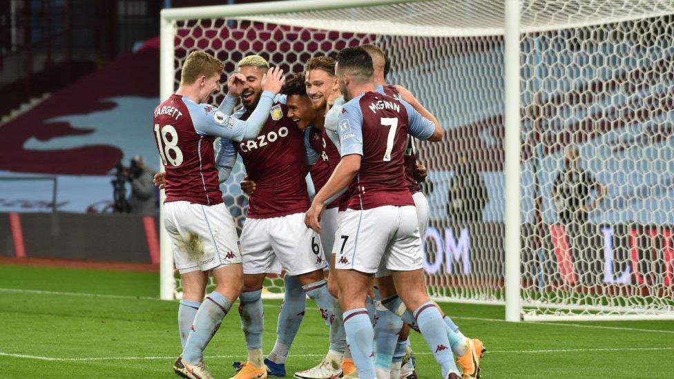 Aston Villa celebrate fourth goal against Liverpool