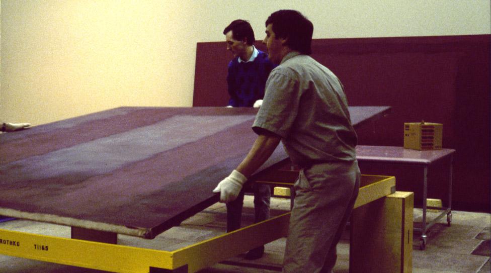 Ken Simons (right) handling a Mark Rothko