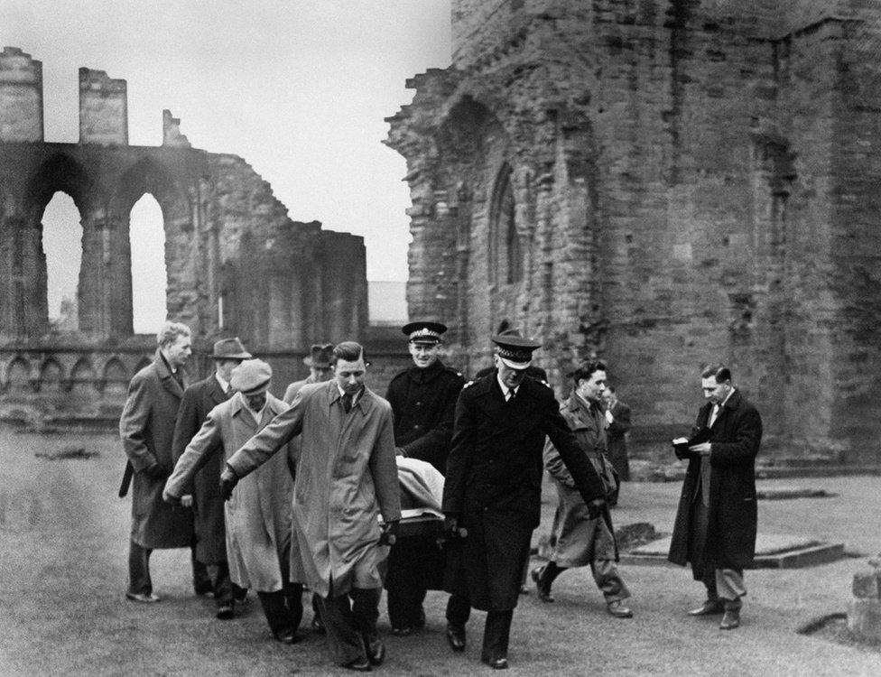 The Stone of Scone - the Scottish Stone of Destiny - missing from Westminster Abbey since Christmas Day, 1950 - being removed from Abroath Abbey, Forfarshire, Scotland after being handed to the Custodian of the Abbey James Wiseheart by Scottish Nationalists.