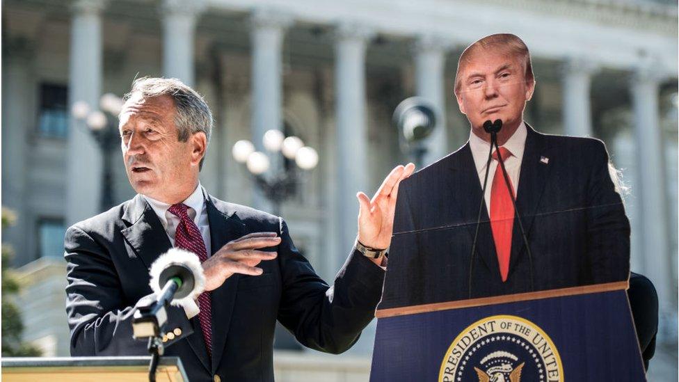 Mr Sanford speaking during his campaign alongside a cardboard cutout of Mr Trump