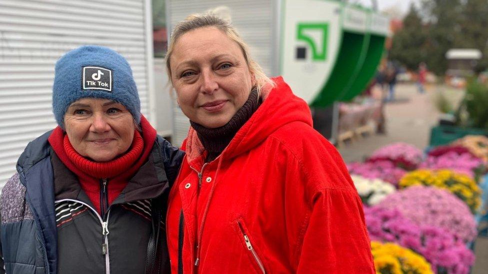 Tatiana and another woman stand in Kherson