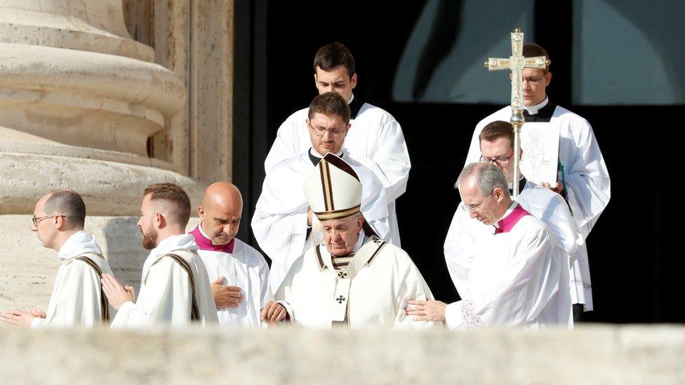 Pope Francis and clergyman