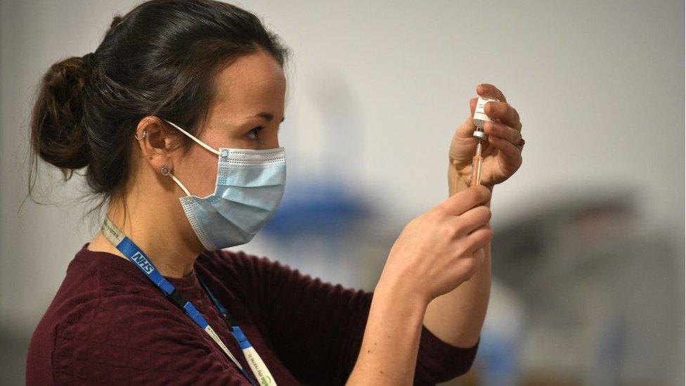 Woman with vaccine