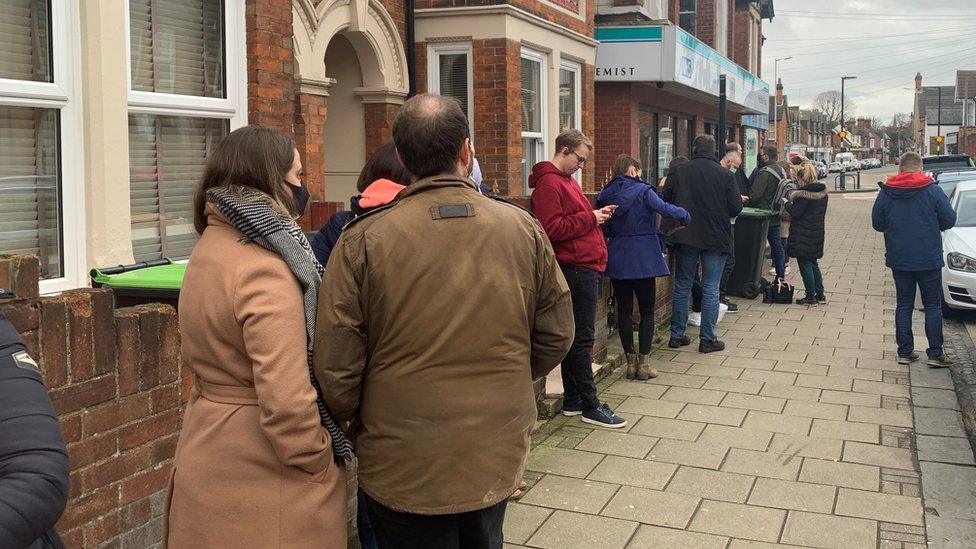 Queue outside Kidman's Chemist, Bedford