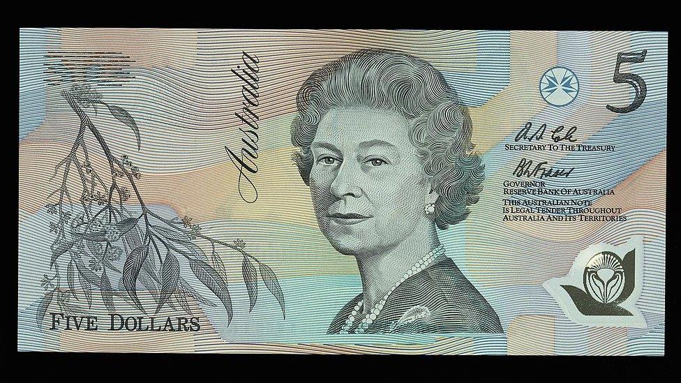 An Australian five dollar note featuring an image of Queen Elizabeth II.