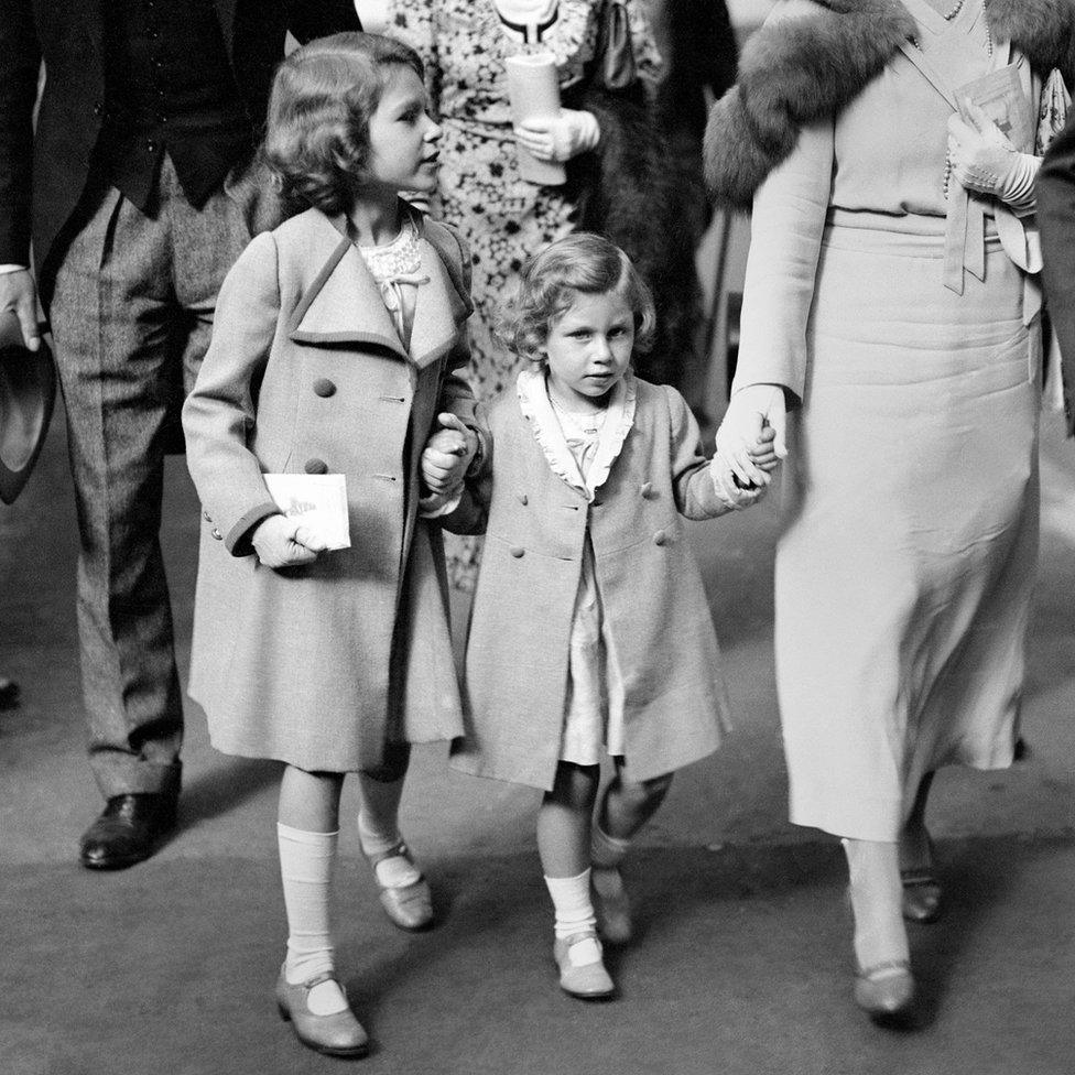 The Duchess of York (right) with Princess Elizabeth and Princess Margaret arriving at Olympia for the International Horse show