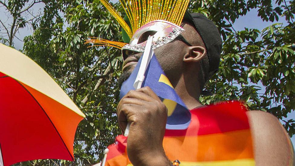 Ugandan gay activist taking part in a march - 2015