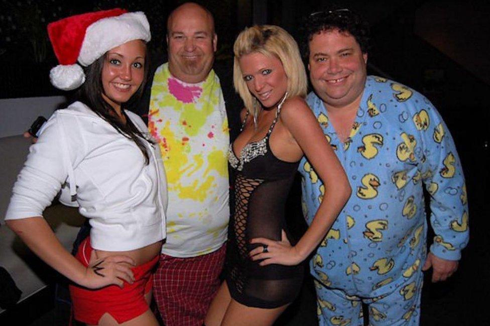 The congressman (right) posed with women at a fancy dress party in 2010