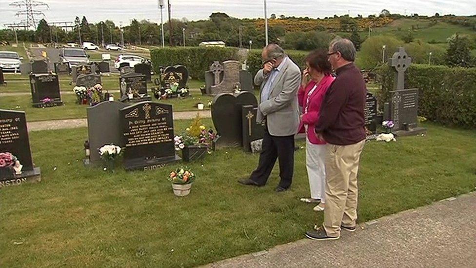 Seamus Ruddy's siblings - Terry, Gertie and Kieran - gathered around their parents's grave on Saturday