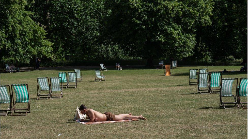 man sunbathing