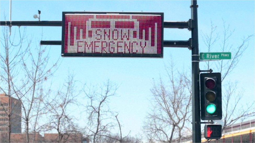 Snow emergency sign.