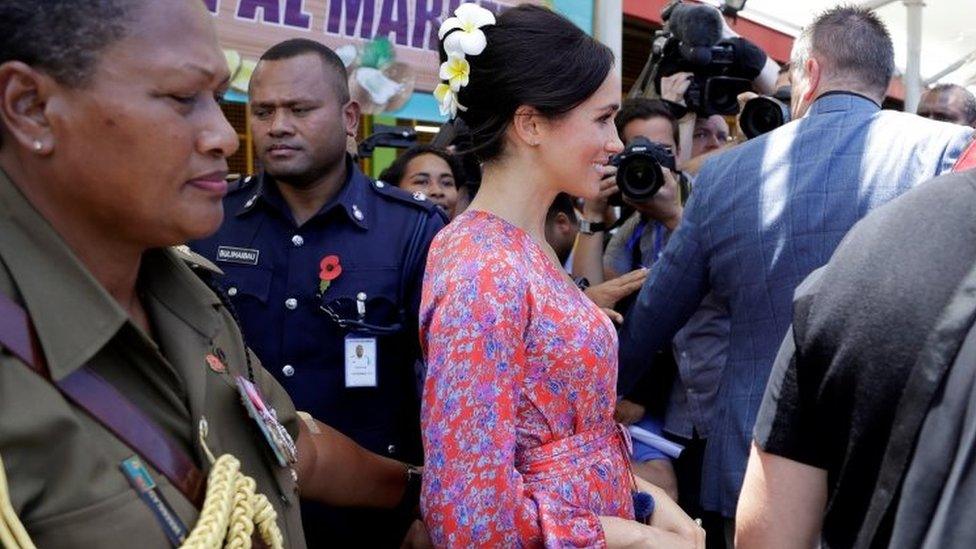 Meghan, Duchess of Sussex, visits a market in Suva, Fiji, Wednesday, Oct. 24, 2018