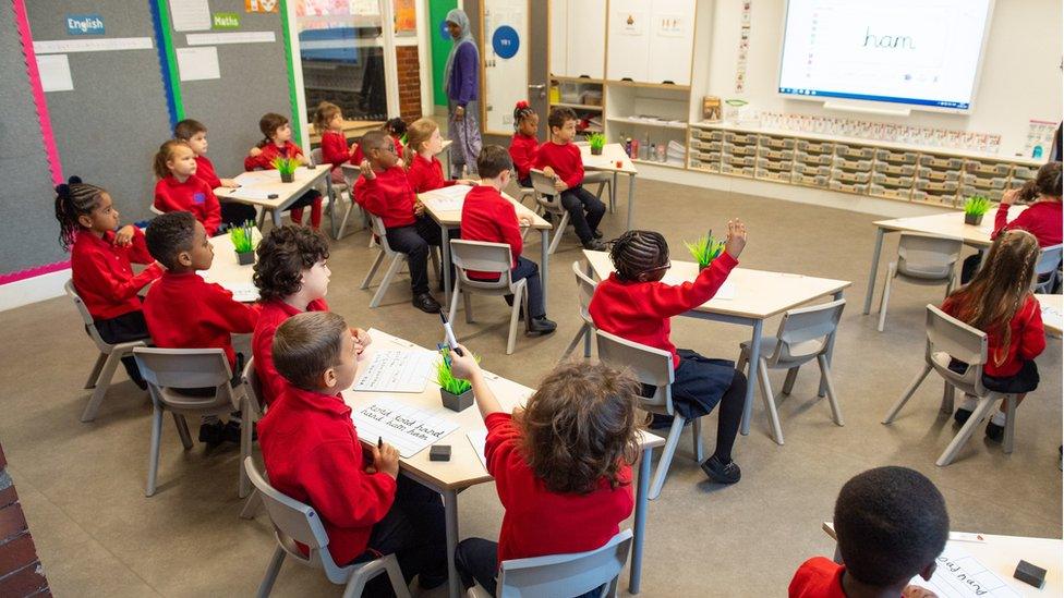 Pupils on the first day back to school at Charles Dickens Primary School in London, as schools in England reopen to pupils following the coronavirus lockdown. Approximately 40% of schools are expected to welcome back students for the start of the autumn term today, despite concerns being raised about their ability to reopen safely.