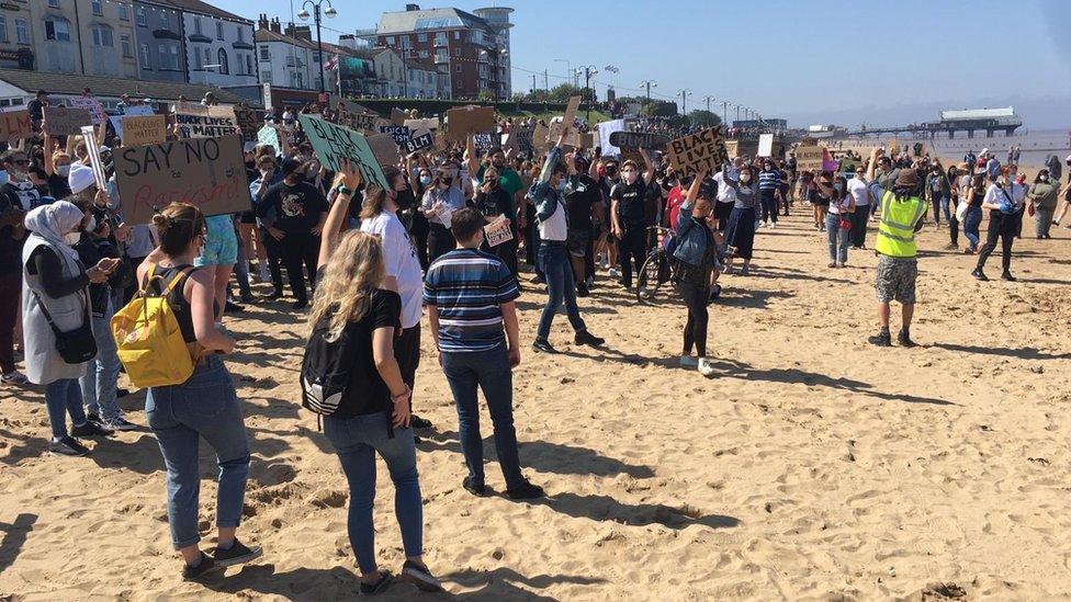 People at a Black Lives Matter protest on Cleethorpes beach