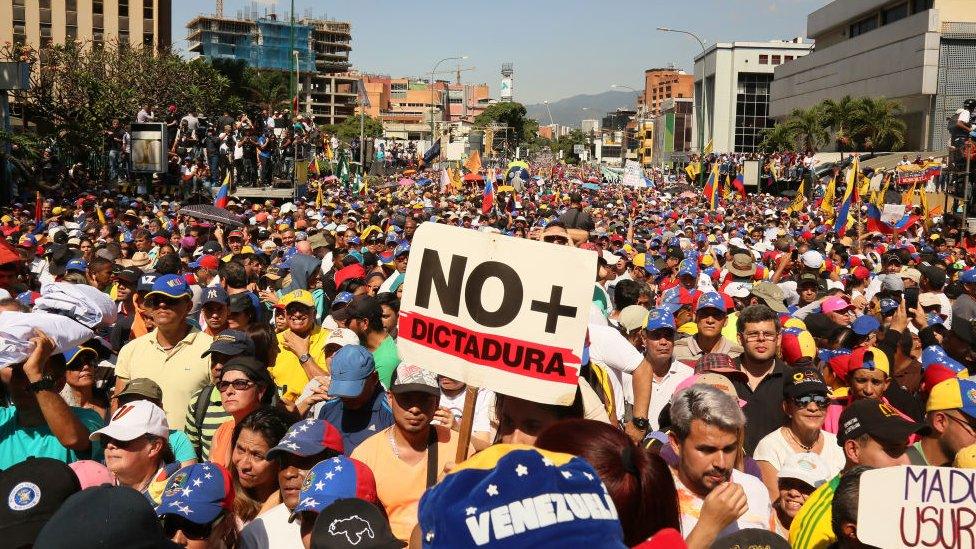 Demonstrators protest against the government of Nicolás Maduro on the Main avenue of Las Mercedes, municipality of Baruta, on February 2, 2019 in Caracas, Venezuela.