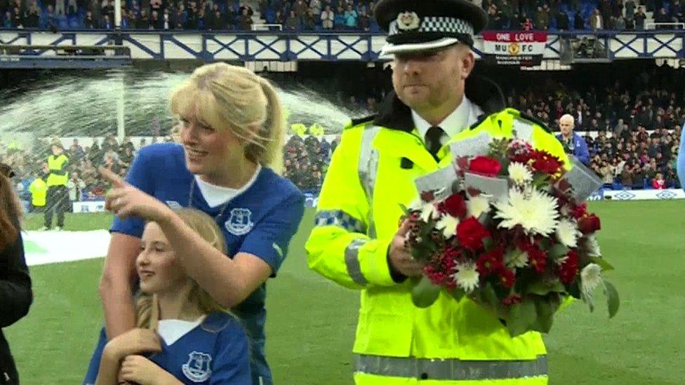 PC Dave Phillips' widow and daughter at Everton match