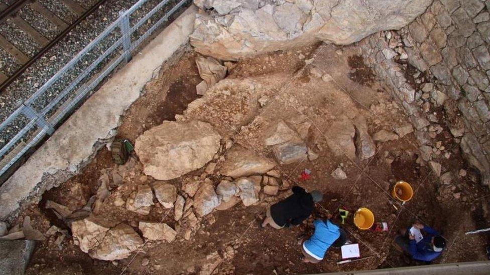 Researchers at a site studying Neanderthals