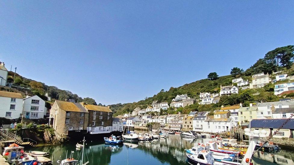 Polperro, Cornwall under a clear blue sky