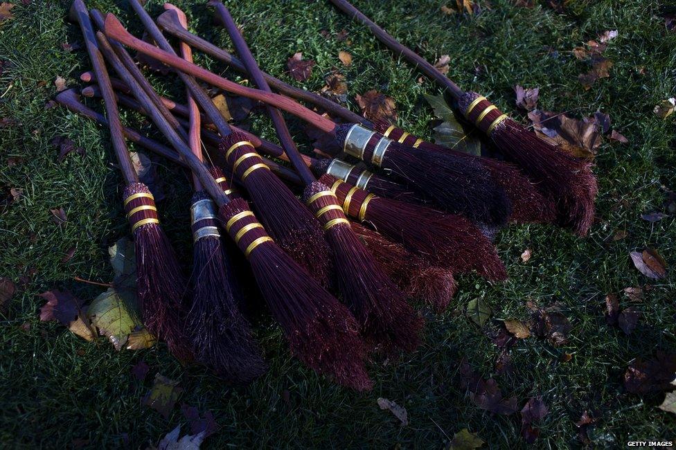 Brooms on the side of a Quidditch pitch