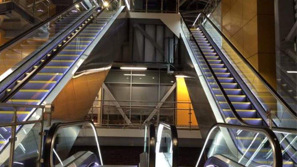 Train station escalators